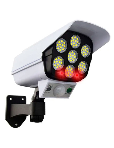 Tradineur - Foco solar LED de pared con sensor de movimiento y mando, forma de cámara de seguridad, 770 lumen, impermeable, incl
