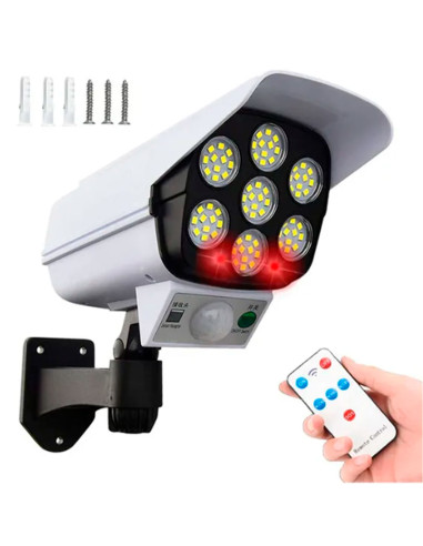 Tradineur - Foco solar LED de pared con sensor de movimiento y mando, forma de cámara de seguridad, 770 lumen, impermeable, incl